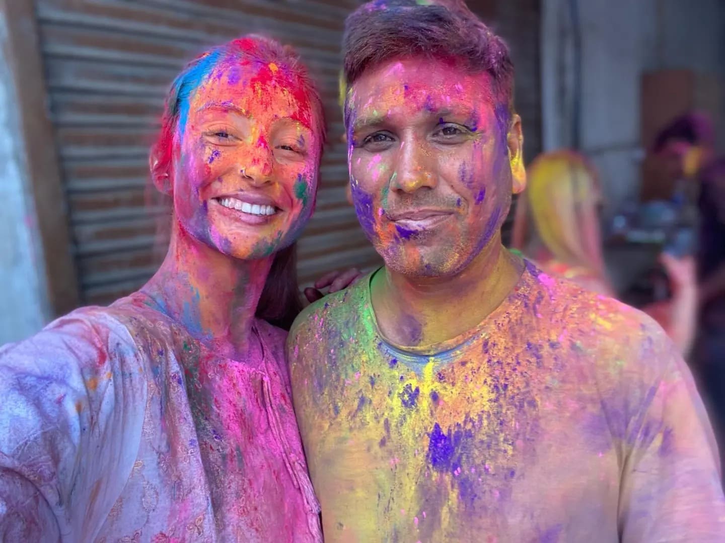 Surender celebrating Holi with a traveler in Rajasthan
